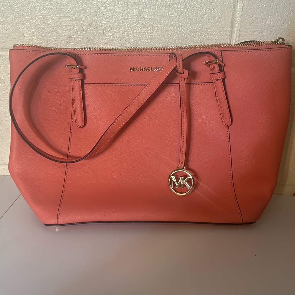 Like new Michael Kors coral bag